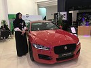 Women staff fill car showrooms