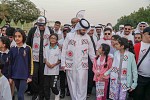 His Highness Sheikh Mansoor joins hundreds at the Walk Unified™ initiative