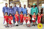 Nursery children gift Eid packages to labourers