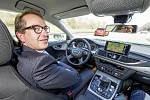 Germany’s Federal Minister of Transport Dobrindt tests piloted Audi
