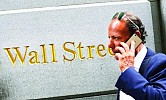Wall Street joins global stocks slide; euro and bonds rise