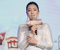 GONG LI SHINES IN PIAGET JEWELRY  AT THE PREMIERE OF THE MONKEY KING II