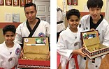 Saudi kid honors his taekwondo coaches