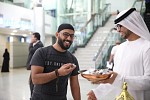 Sharjah International Airport distributes Iftar meals to Fasting Travelers