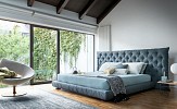 Make your bedroom a haven of relaxation and privacy with the Full Moon bed by Bonaldo